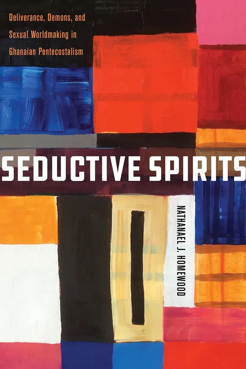 书封《Seductive Spirits: Deliverance, Demons, and Sexual Worldmaking in Ghanaian Pentecostalism》,作者 Nathanael J. Homewood;蓝红橙黑等色块拼接的抽象几何设计。