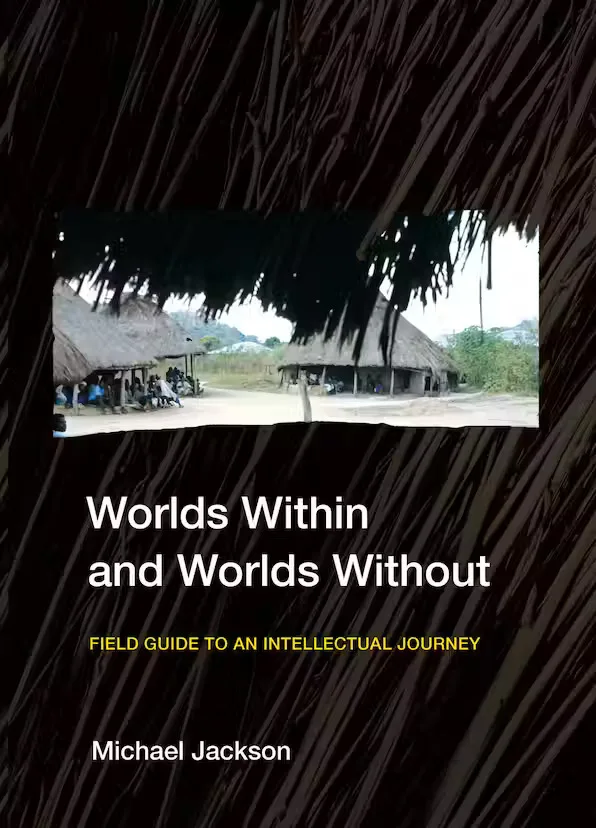 封面书名Worlds Within and Worlds Without:Field Guide to an Intellectual Journey,作者Michael Jackson;深色茅草纹理背景中嵌入一张村庄茅草屋聚落的照片。